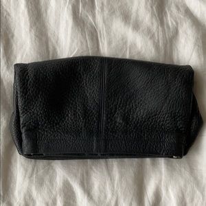 Toni black leather clutch